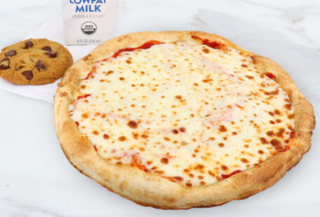 Kid's Cheese Pizza on Marble Surface