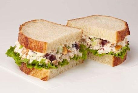 Chicken Salad Sandwich with celery, scallion, sliced almonds, red grapes, lettuce, Dijon and mayo on sliced sourdough