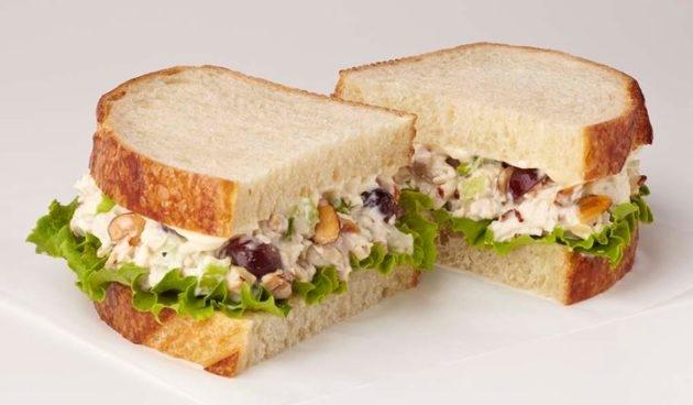 Chicken Salad Sandwich with celery, scallion, sliced almonds, red grapes, lettuce, Dijon and mayo on sliced sourdough