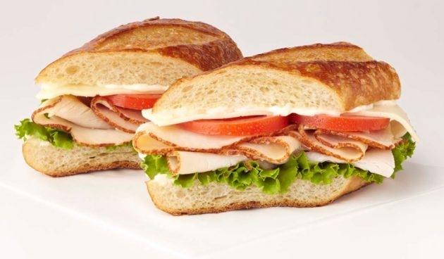Turkey Havarti Sandwich with tomatoes, lettuce and mayo on a sourdough baguette