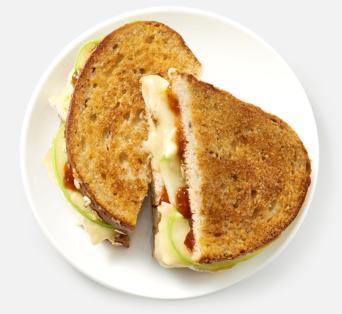 Grilled Brie with apples and fig jam on Parmesan-crusted multigrain bread