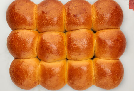 Brioche Dinner Rolls on Marble Surface