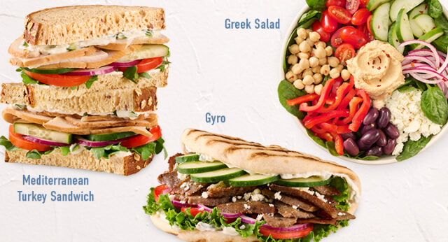 Gyro, Mediterranean Turkey Sandwich and Greek Salad on White Surface