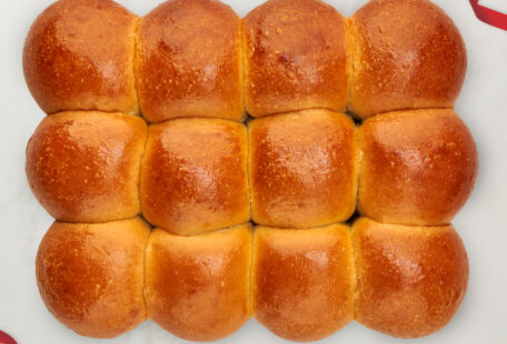 Brioche Dinner Rolls on Marble Surface