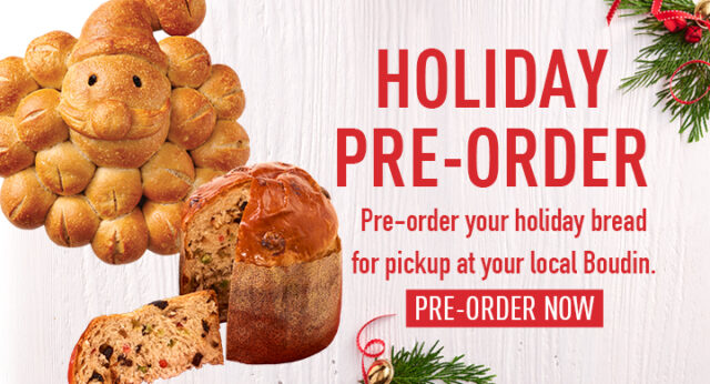 Sourdough Santa and Panettone on white wood surface for holiday pre-order