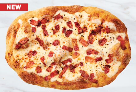 Bacon Carbonara Pinsa Pizza on Marble Surface