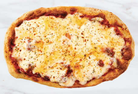 Four Cheese Pinsa Pizza on Marble Surface