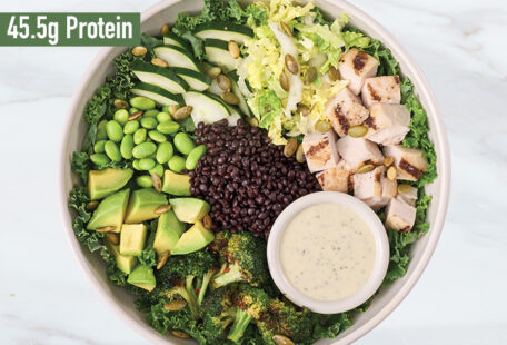 Green Goddess Chicken with Avocado protein bowl on marble surface
