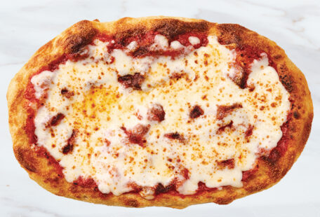 Kid's Cheese Pinsa Pizza on Marble Surface