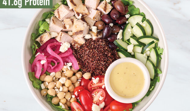 Mediterranean Chicken with Lemon Hummus protein bowl on marble surface
