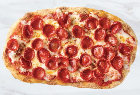 Pepperoni Pinsa Pizza on Marble Surface