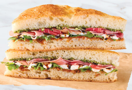 Prosciutto & Stracciatella Pesto Sandwich on Marble Surface