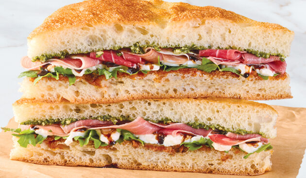 Prosciutto & Stracciatella Pesto Sandwich on Marble Surface