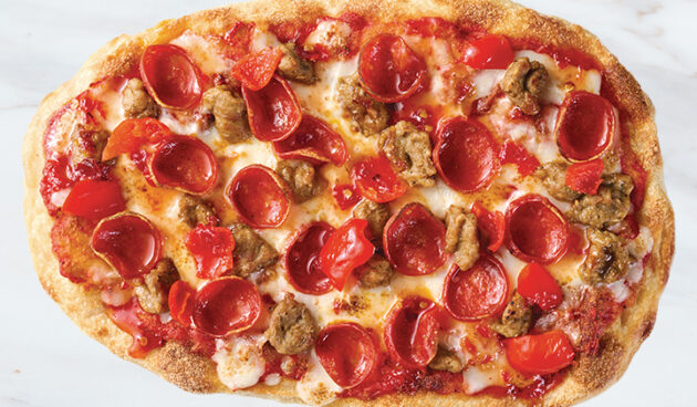 Sausage, Pepperoni & Hot Honey Pinsa Pizza on Marble Surface